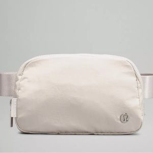 BRAND NEW white lululemon Fanny pack! Comes with original tags and bag
